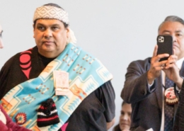 Image of council members from Musqueam Indian Band, Squamish Nation, Tsleil-Waututh Nation, and City of Vancouver, at a ceremony recognizing the passing of the UNDRIP strategy